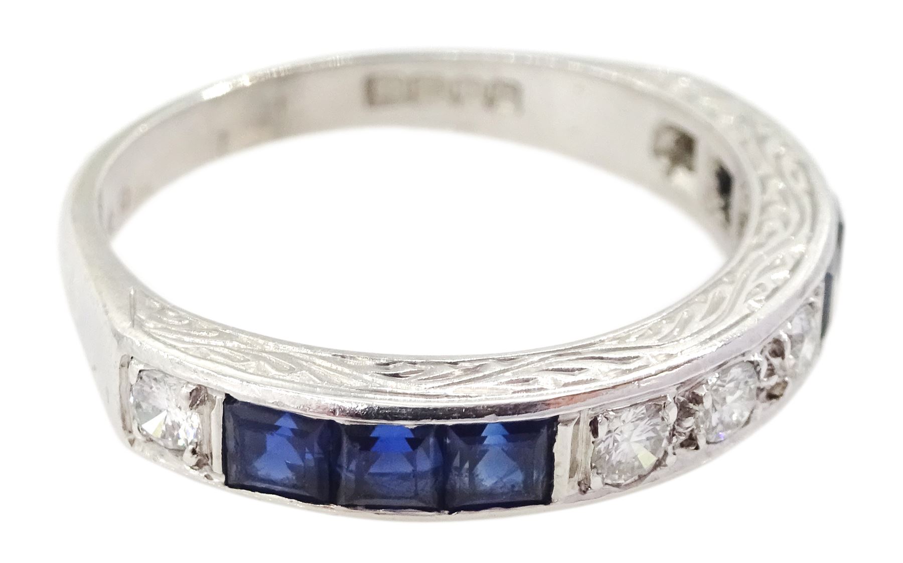18ct white gold round brilliant cut diamond and calibre cut sapphire half eternity ring, London 1972, total diamond weight approx 0.30 carat