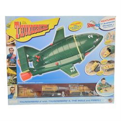 Three Vivid Imaginations Thunderbirds vehicles, comprising Thunderbird 1, Thunderbird 2 with Thunderbird 4, The Mole and Firefly and Thunderbird 3, all boxed