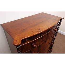  Victorian bow front mahogany chest with foliate carved false frieze top drawer above three drawers with mother of pearl inset wooden handles, enclosed by barley twist columns on bun turned feet, W113cm, H119cm, D57cm  