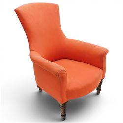 Victorian coral red upholstered armchair, the swept high back above padded arms with rolle...