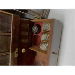19th century mahogany travelling apothecary cabinet, with recessed brass carry handle to top, and two deep-section hinged doors to the front opening to reveal a fitted interior with clear glass bottles and two drawers, H27cm