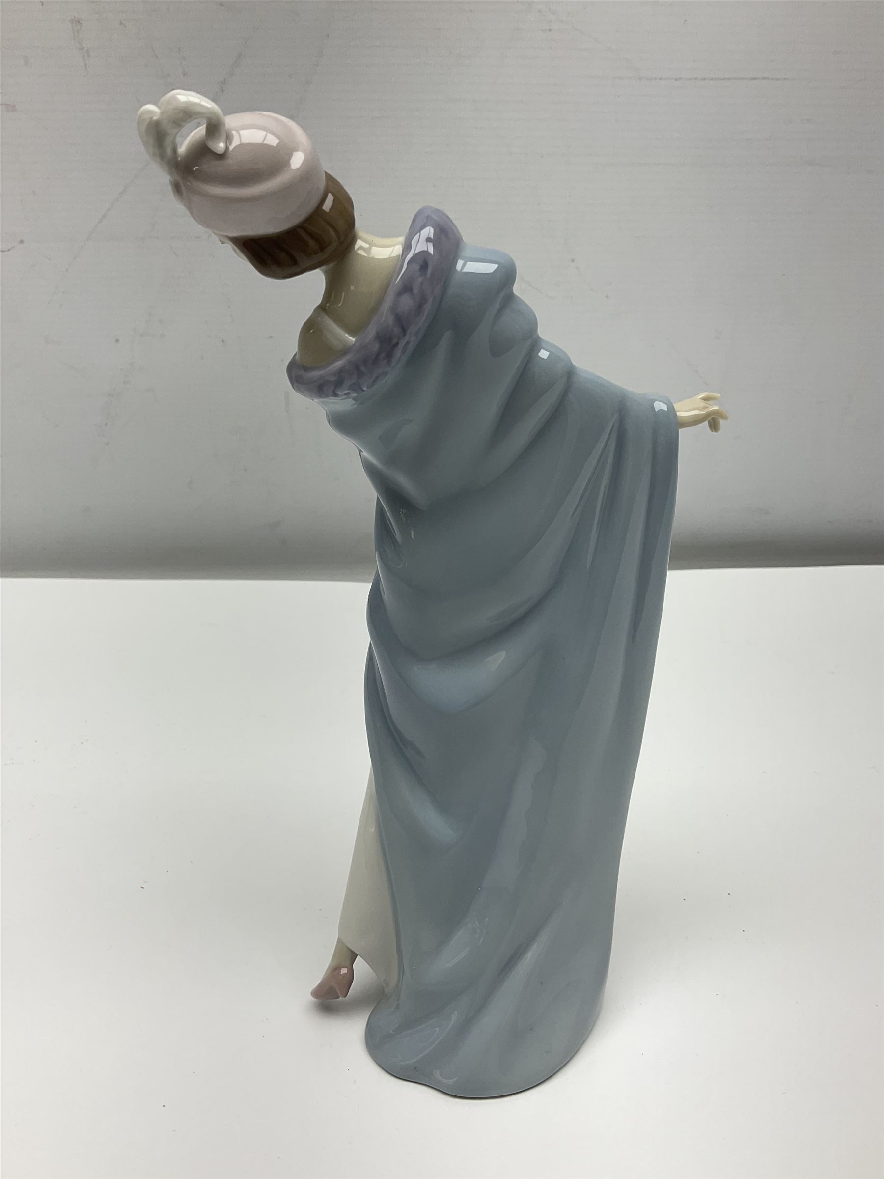 Three Lladro figures of ladies comprising 'The Flirt' model no 5789, 'Ingenue' model no 5487 and 'Carefree' model no 5790, all with boxes