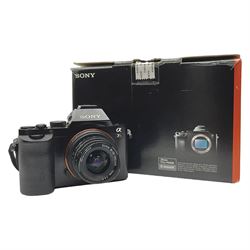 Sony Alpha 7R ILCE-7R camera body, serial no. 3985804, with 'Voigtlander Super Wide-Heliar f/4.5 15mm' lens, serial no. 9250212, camera with charger and in original box