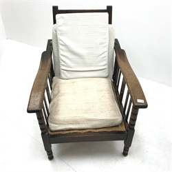 Early 20th century oak reclining armchair , turned supports, W71cm