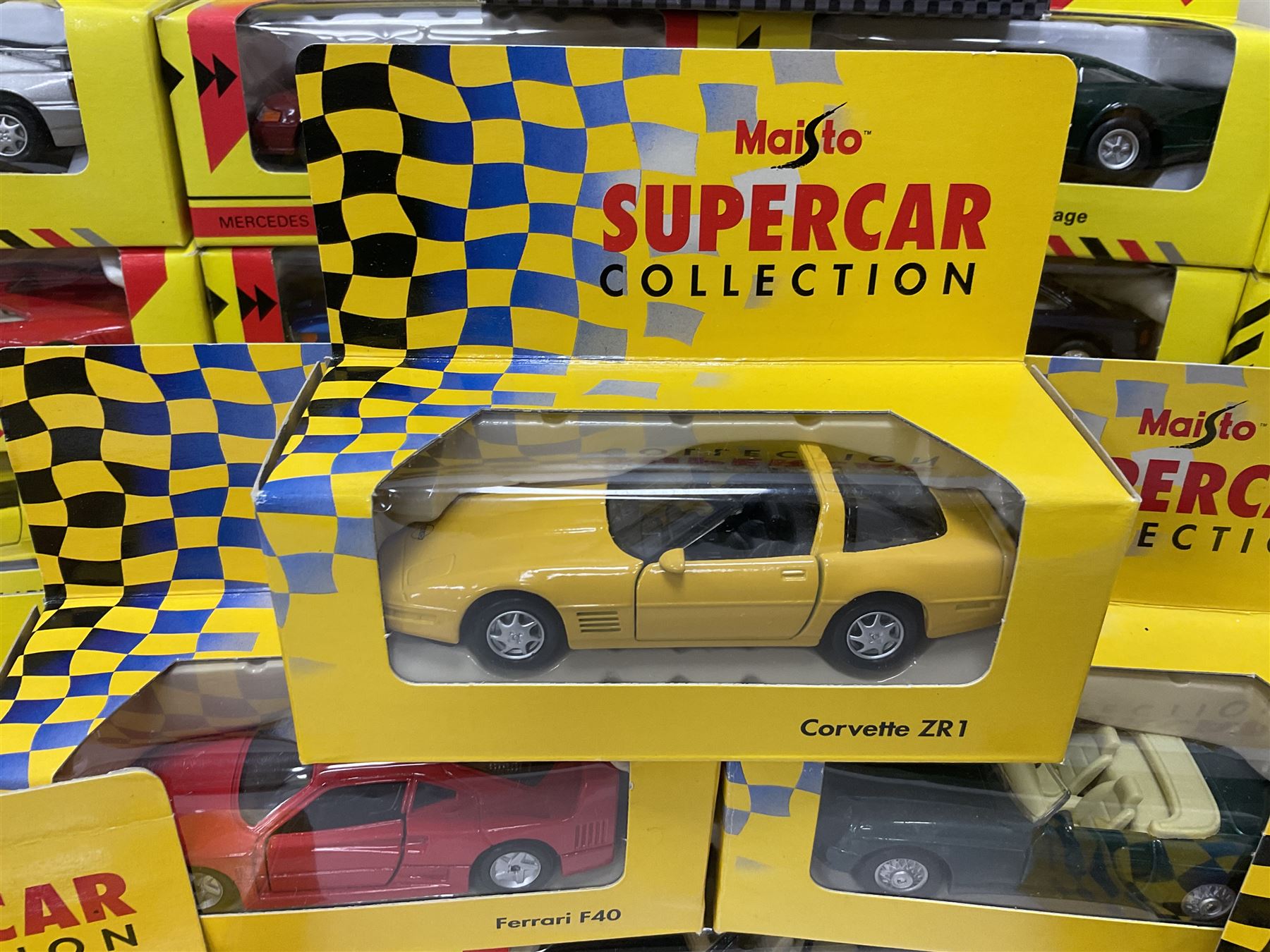 Shell/Maisto - twenty five 1:43 scale die cast cars comprising eighteen Shell and seven Maisto ‘Supercar Collection’ models with further 1:24 scale Maisto McLaren F1 model; all boxed (26) 