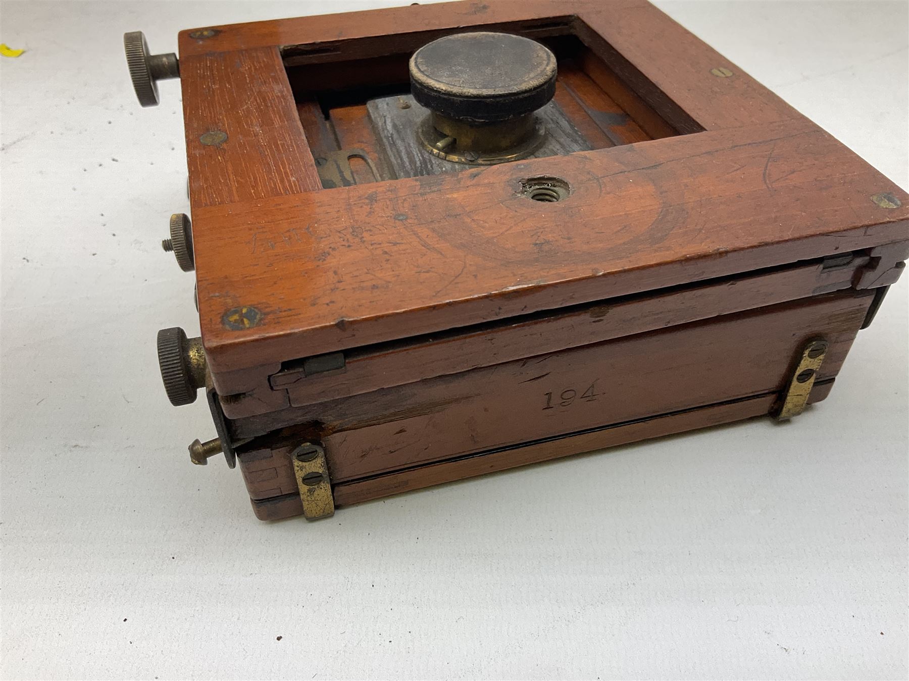 19th Century 'Empire cinematograph camera No.3, Manufactured by W.Butcher & Sons ltd'  in a wooden box with hinged handle 