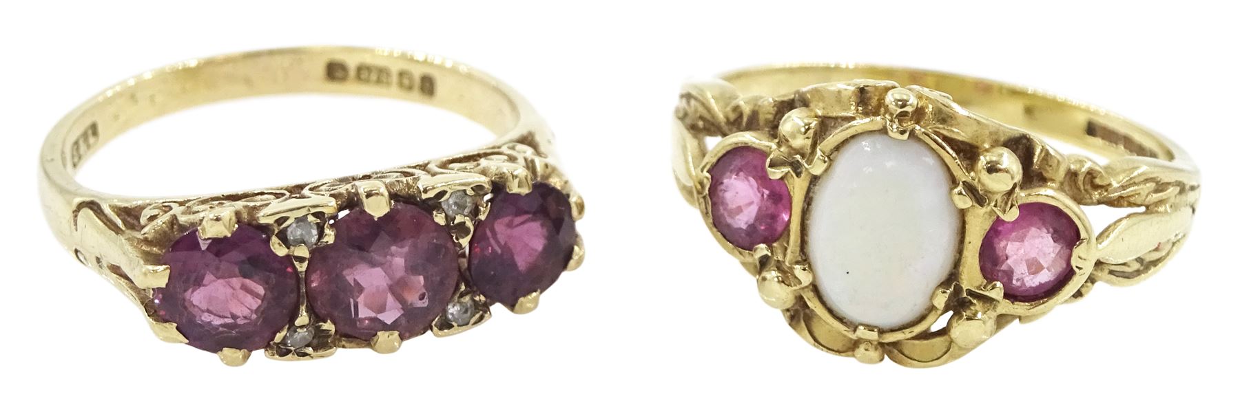 Gold three stone garnet and opal ring and a gold garnet and diamond ring, both hallmarked 9ct