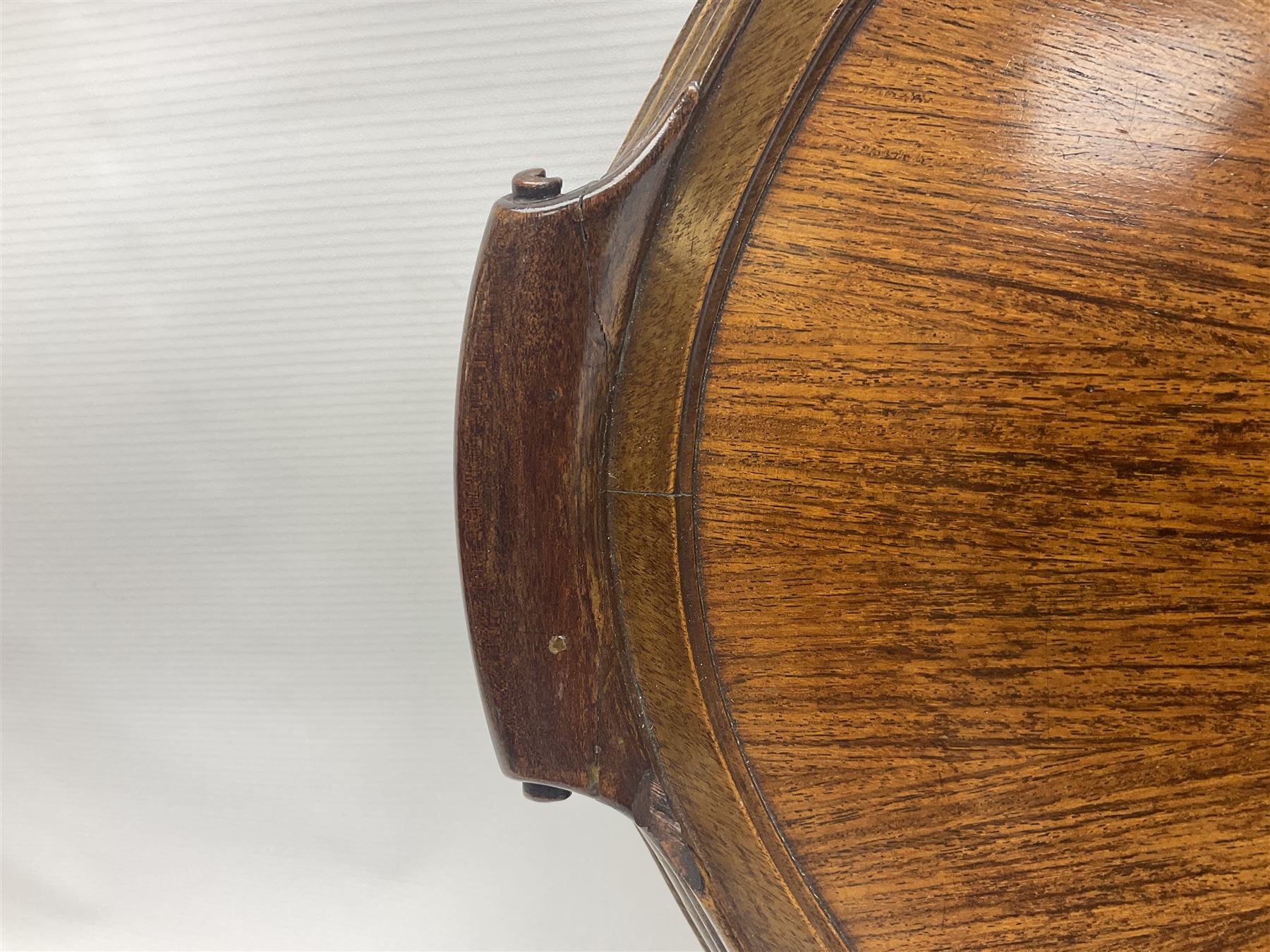 Late 19th/early 20th century mahogany and marquetry inlaid tray, of oval form with twin scrolled handles and moulded border, the central panel inlaid with figures seated at a table drinking tea, L99cm