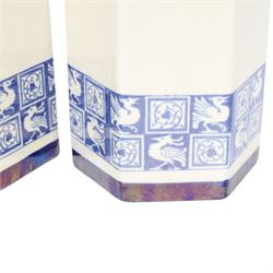 Pair of 1920's Art Deco Royal Doulton lustreware hexagonal vases, with boards of checkerboard design of alternating bird and scroll motifs, designed by Reco Capey, H28cm
