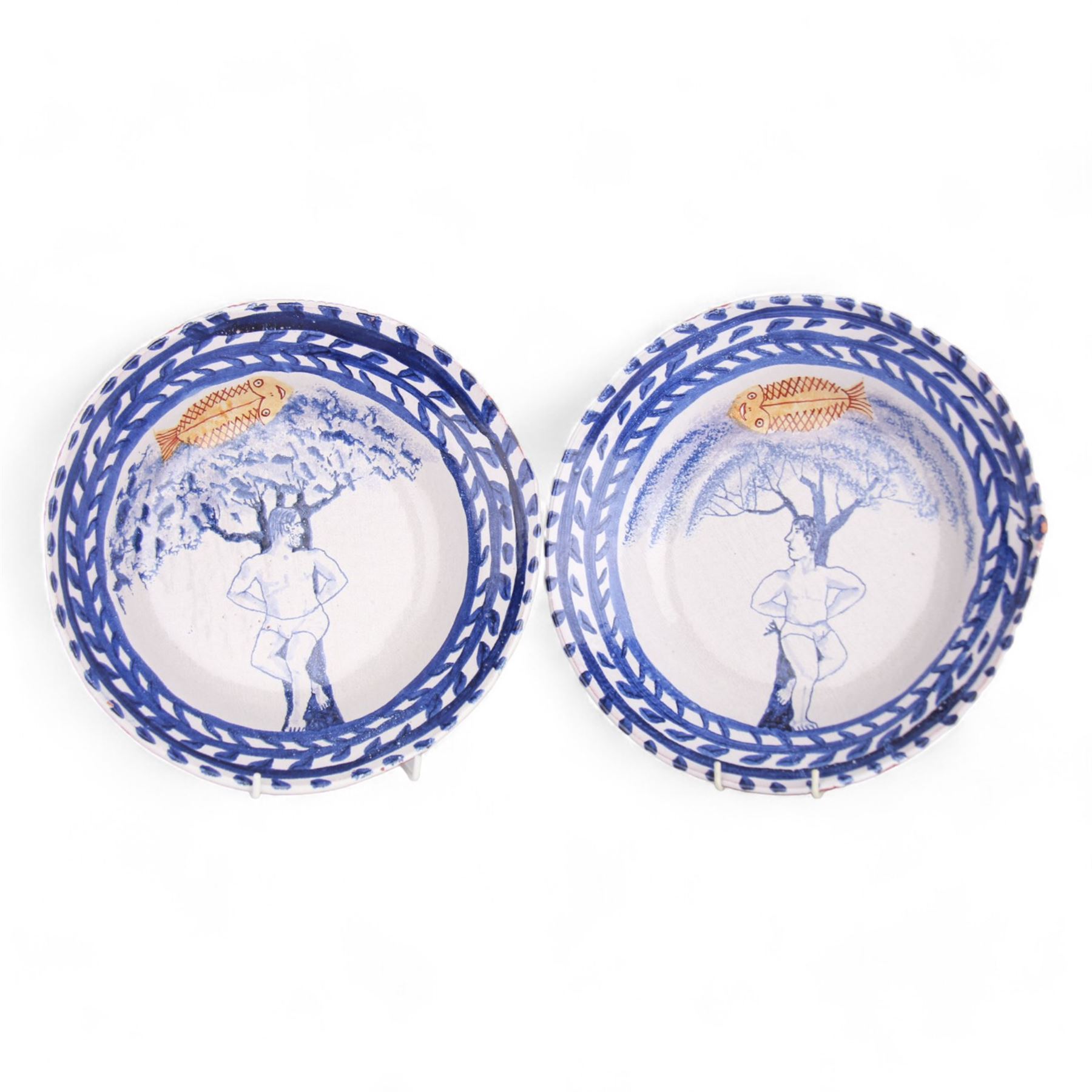 Hylton Nel (1941-); Two bowls, 1999, each decorated internally with a figure of a man stood beneath a tree with stylised fish to the top, with makers mark and date to the base HN. 17.5.95