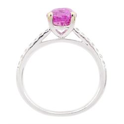 18ct white gold pink sapphire and diamond ring, single oval cut sapphire of approx 2.80 carat, with round brilliant cut diamond shoulders, hallmarked