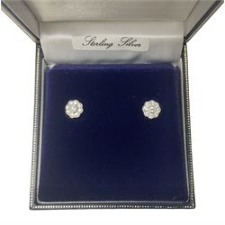 Pair of silver cubic zirconia daisy cluster stud earrings, boxed 