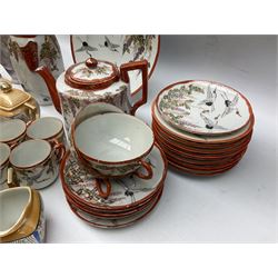  Japanese eggshell tea service, decorated with cranes and wisteria, to include teapot, coffee pot, coffee cans plates etc, together with another coffee set and John Lewis coffee cans  
