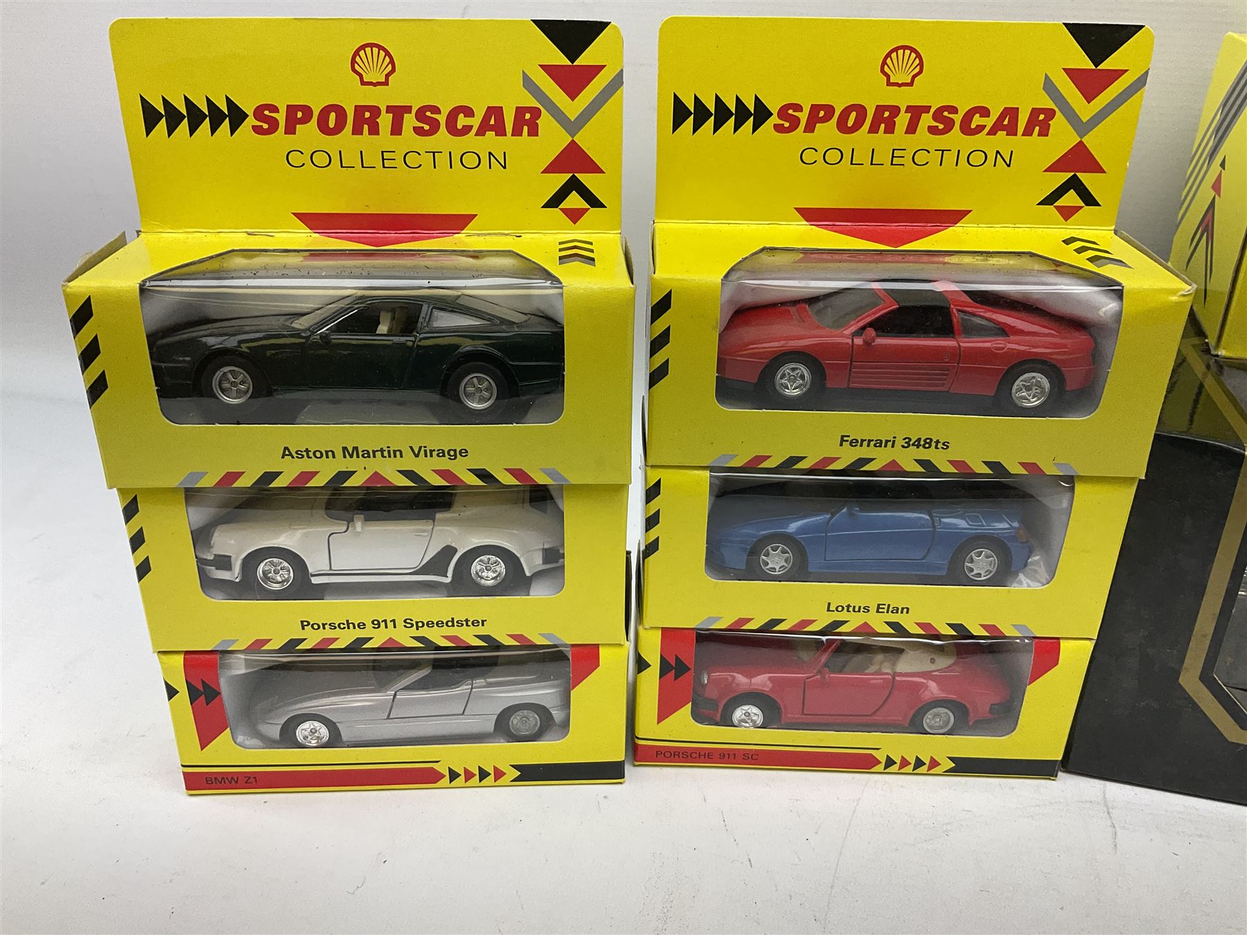 Seventeen Shell Sportscar Collection die-cast models including 1:24 scale Jaguar XJ220 by Maisto; and Bburago 1:20 scale die-cast model Mercedes Benz 500K Roadster (1936); all boxed (18)