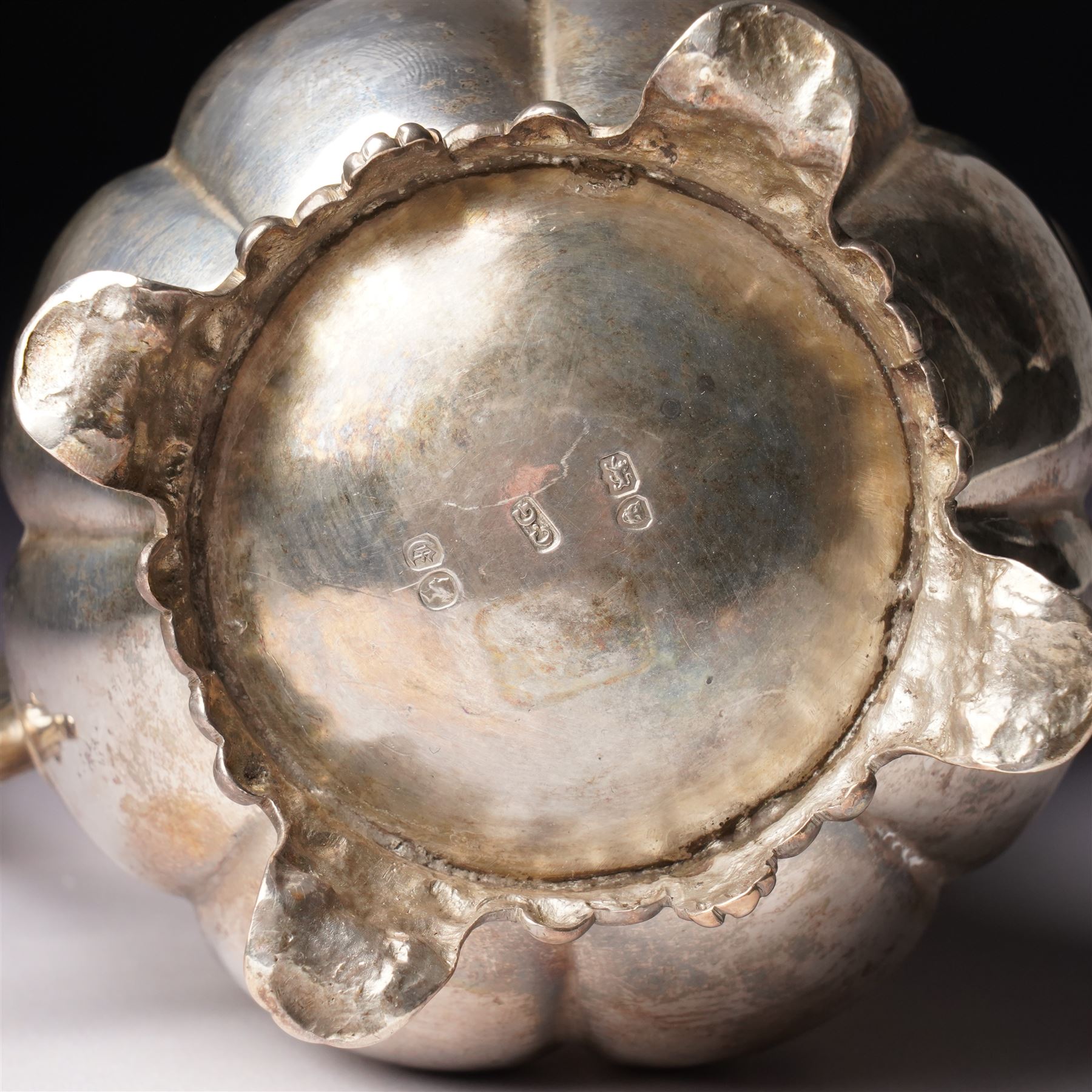 Victorian silver cream jug of panel sided baluster form with crimped rimand scroll handle on shaped supports London 1840 Maker Charles Gordon  