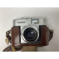 Collection of camera bodies and lenses, to include Olympus OM-1 camera body, serial no 106567, with 'Olympus OM-System F.Zuiko Auto-S 1:1.8 f=50mm' lens, serial no 135097,  Zenit-B camera body, serial no 71017867, with 'Helios-44-2 2/58' serial no 7500040, Voigtlander Vito B camera body, with 'Voigtlander Colour Skopar 1:2.8/50' lens, 'Olympus OM-System Zuiko Auto-Zoom 1:4 f=75-150mm' lens serial no 104321, 'Tamron SP 35-210mm 1:3.5-4.2' lens etc 