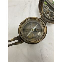 Brass military compass marked Brinton Compass, Thos Evans and Son London, L9cm
