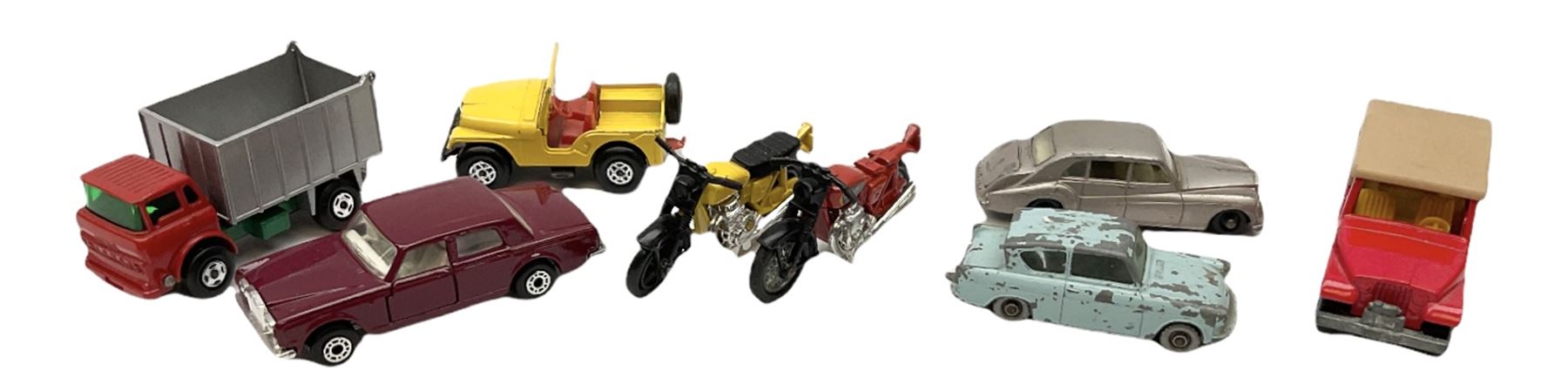 Matchbox/Superfast - nine '1-75' series models comprising 64d Fire Chief car, 65e Airport Coach, 66f Tyrone Malone Superboss, 68e Chevrolet Van, 69e Security Truck, 71e Cattle Truck, 72d Bomag Road Roller, 75c Alfa Carabo and 75e Helicopter; all boxed; and eight unboxed and playworn models (17)