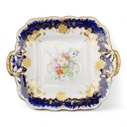 19th century porcelain part tea service, probably Spode, comprising sucrier, milk jug, sandwich plate, seven cups and two saucers, decorated with floral sprays, within cobalt blue and gilt borders, pattern no. 735 