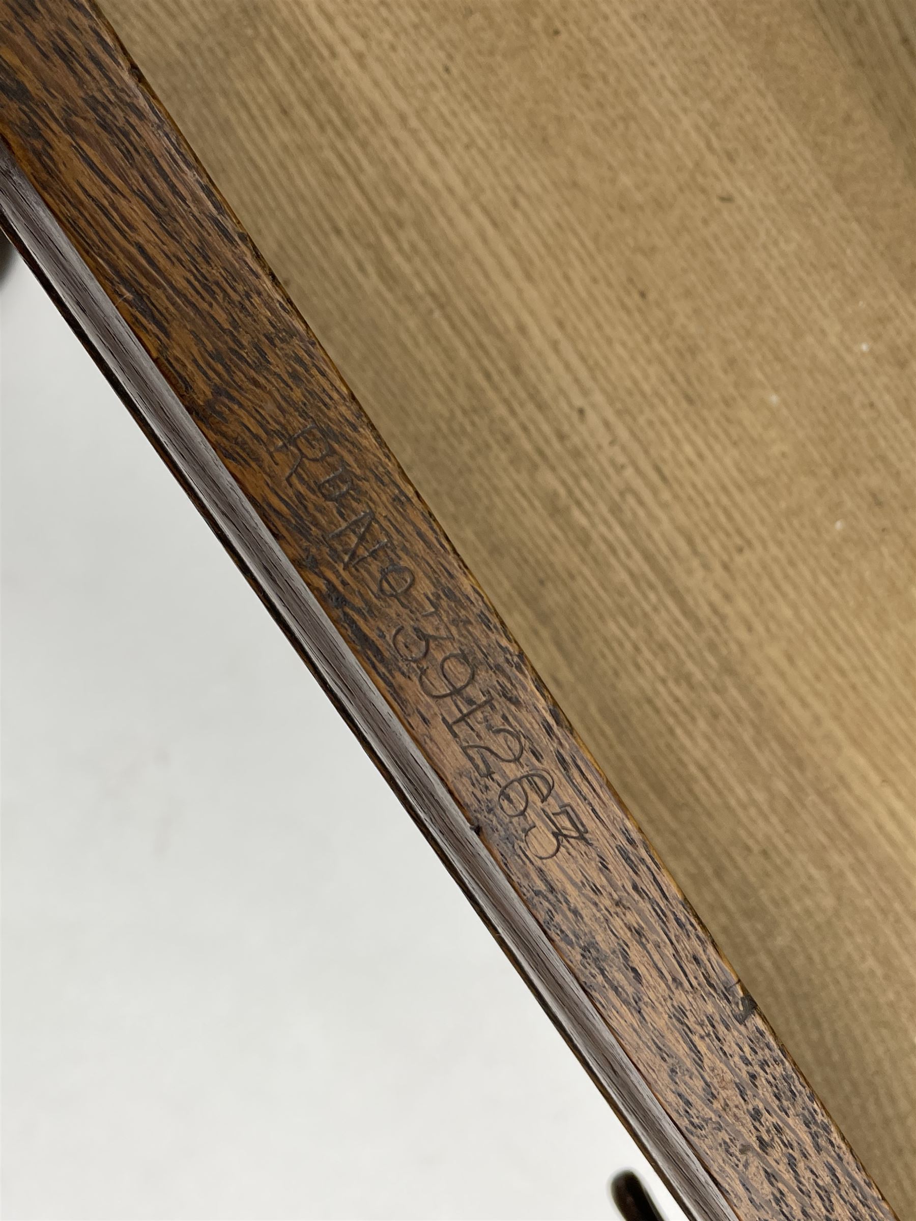 Arts and Crafts period oak mirror back dresser, projecting cornice above rectangular bevelled mirror and shelf, two turned supports, inset copper panel with embossed decoration, rectangular moulded top over two drawers and two panelled cupboard, moulded plinth base, brass and copper strappings and handles 