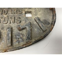 Three cast iron railway wagon plates of D shaped form to include Southern Railway, LMS and GWR, L27.5cm