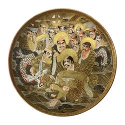 Japanese Meiji period Satsuma dish, decorated with figures and dragon and profusely heightened in gilt, with character mark beneath, D15.5cm