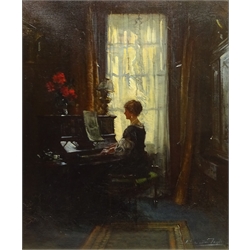  Albert Chevallier-Tayler (Newlyn School 1862-1925): Drawing Room Interior with Lady playing the Piano, oil on canvas, signed and indistinctly dated 60cm x 50cm  