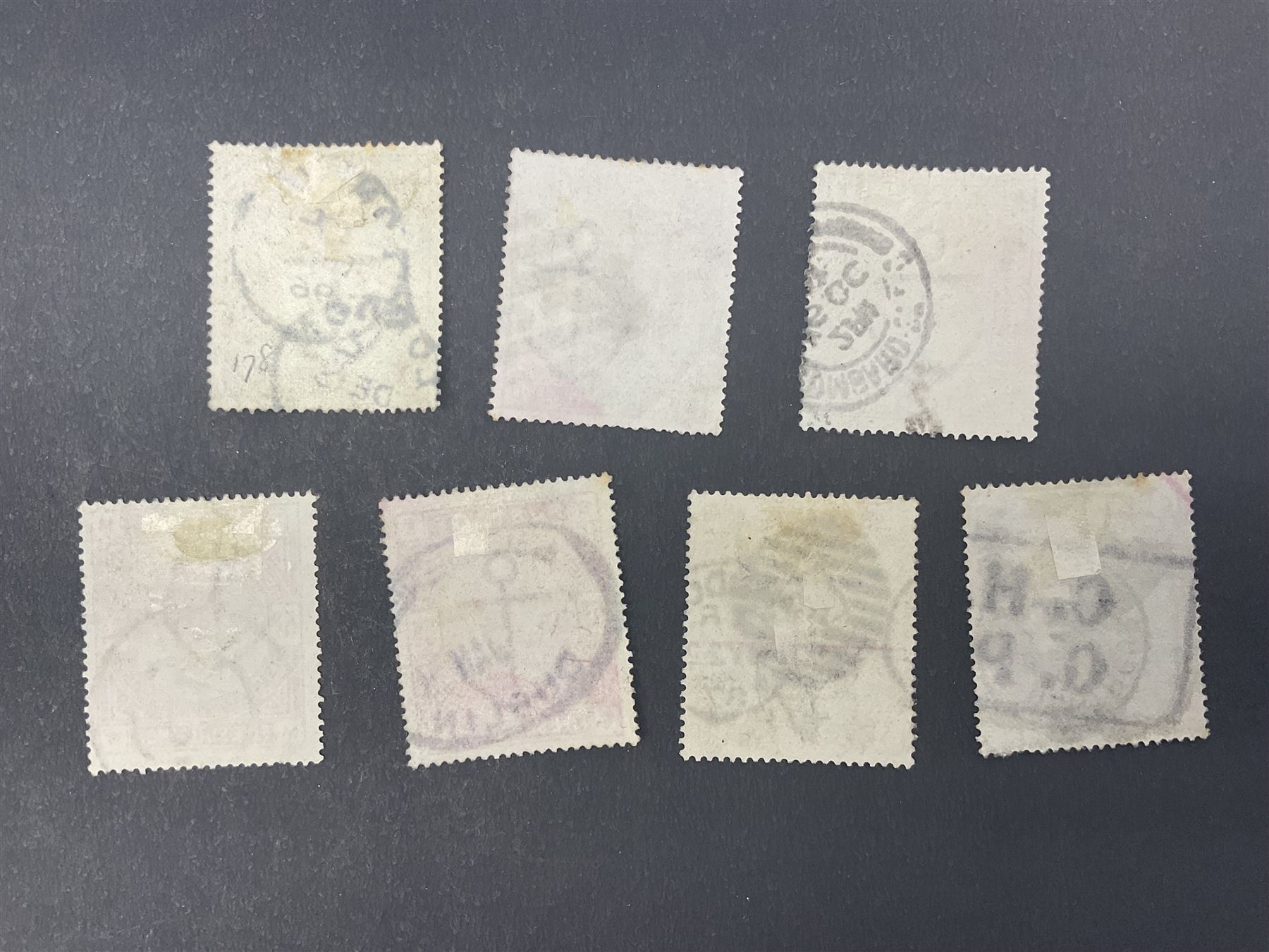 Great Britain Queen Victoria 1883-4 stamps, comprising three two shillings and sixpence, two five shillings and two ten shillings, all used, all previously mounted