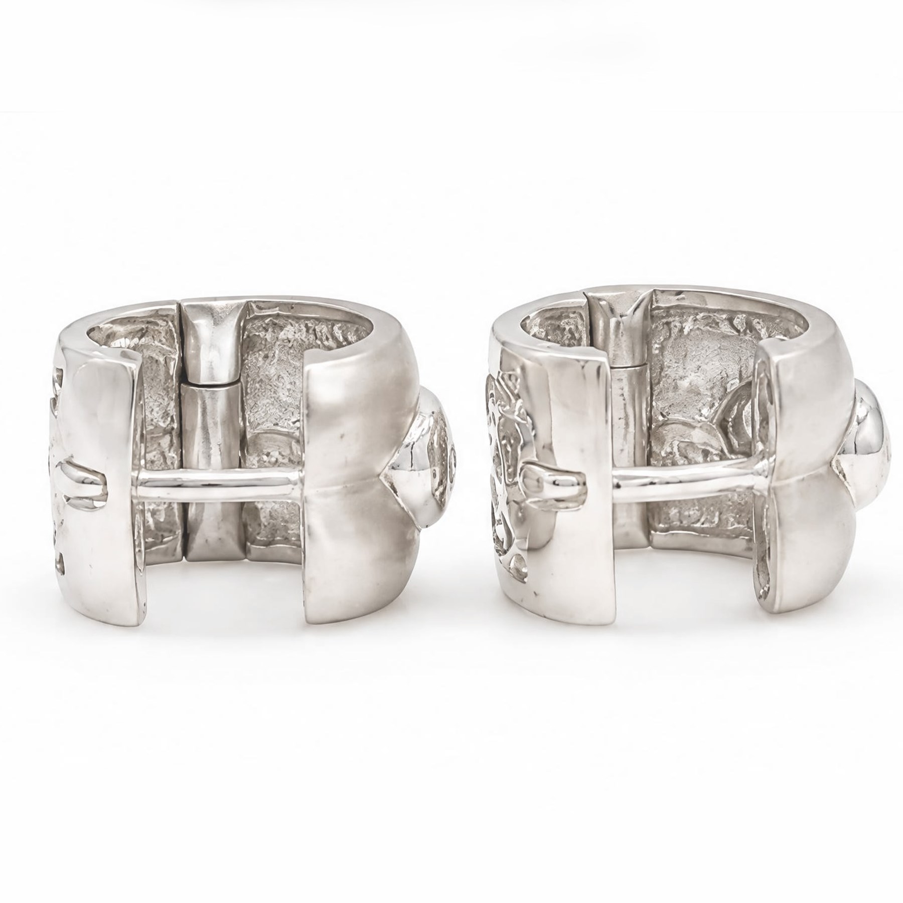 Pair of 18ct white gold diamond brushed and polished hoop earrings, each rubover set with three round brilliant cut diamonds, to a pierced design back, stamped 750