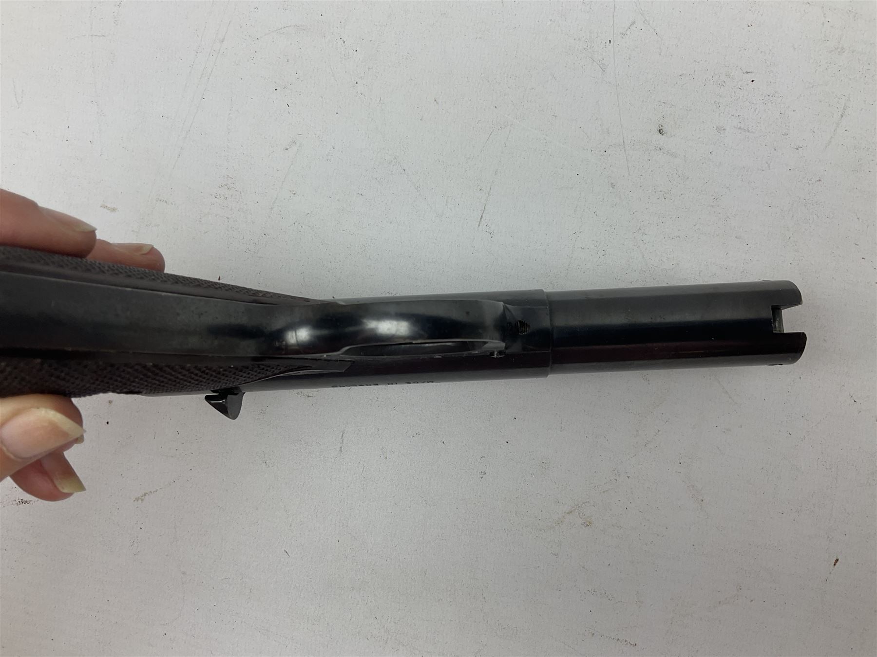 Webley Premier .22 air pistol with over lever action No.902 L24cm; and quantity of .22 pellets in two tins