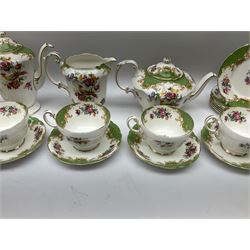 Paragon Rockingham pattern tea set, comprising teapot, coffee pot, four teacups and four saucers, six side plates, six dessert plates, cake plate, two open sucriers, and jug. 
