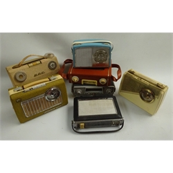  Seven vintage portable radios - KB Super 8, Sky Leader with shoulder strap, G.E.C., Grammont, white bakelite Rhapsody, Bush TR230 and Dansette Chorister  
