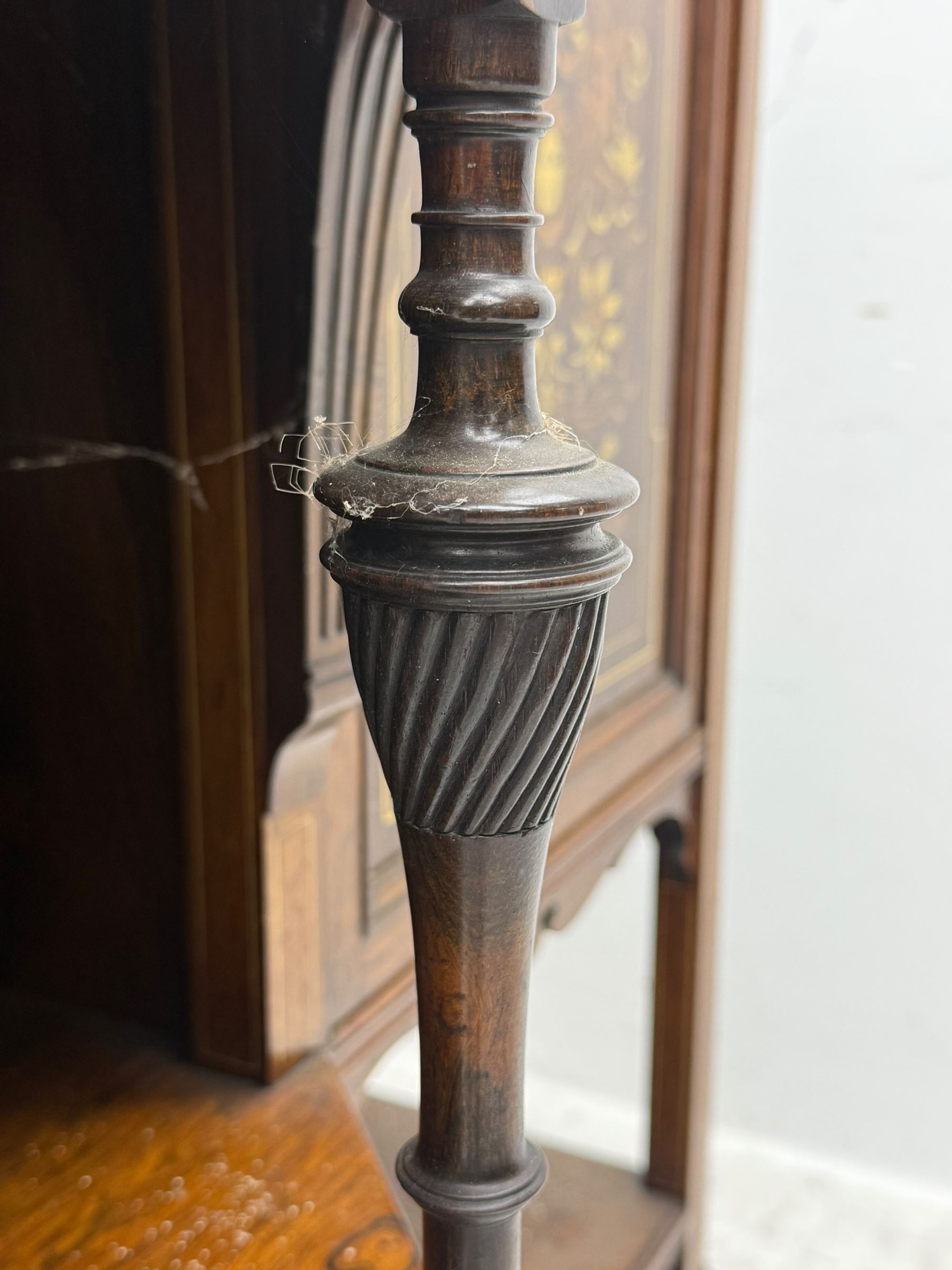 Victorian hardwood and inlaid display cabinet, central breakfront glazed display with astragal glazing and mirror back, flanked by mirrored alcoves with turned supports, below foliate and scrolling marquetry panels enclosing cupboard doors, shaped open shelves with turned supports beneath, on tapered and spade feet