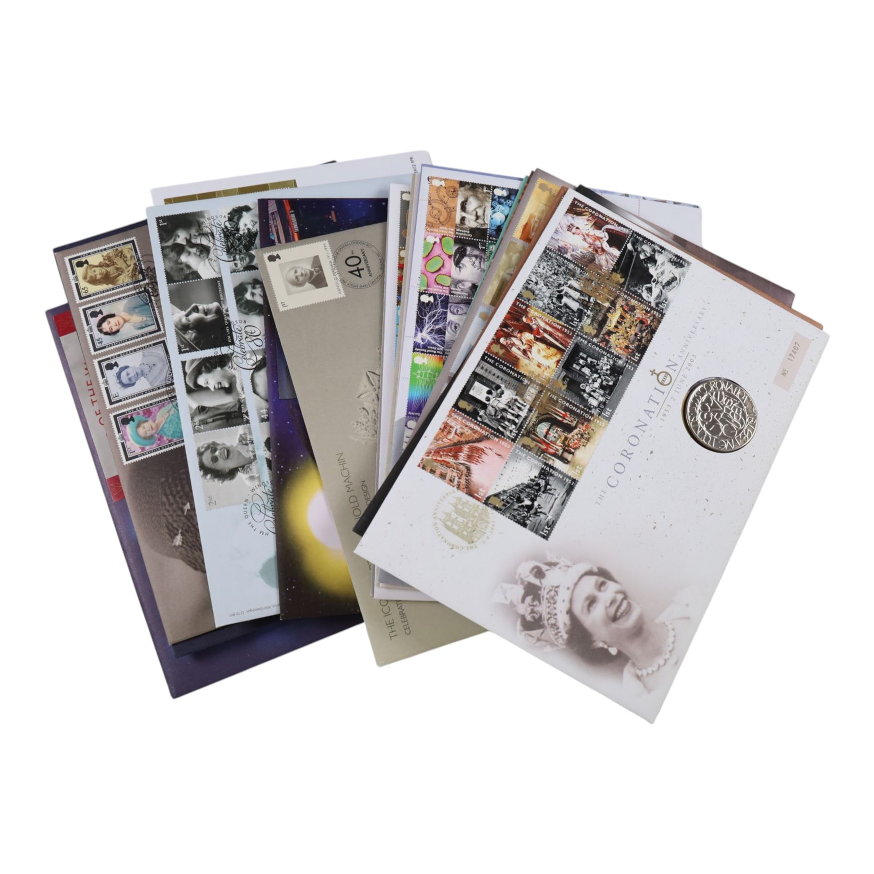 Approximately 104 Royal Mail Royal Mint coin or medallion covers, housed in an official Royal Mail Royal Mint ring binder folder and loose, together with The Queen's Golden Jubilee Coin Cover Collection in two albums, commemorative fifty pences, crowns, etc