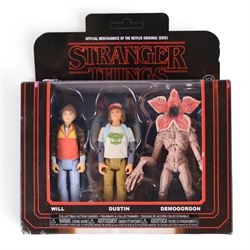 Three Funko Stranger Things figures, comprising Demogorgon, Eleven and Will figures and two three-figure packs comprising Will, Dustin and Demogorgon three-pack and an Eleven, Will and Demogorgon three-pack, all boxed or carded