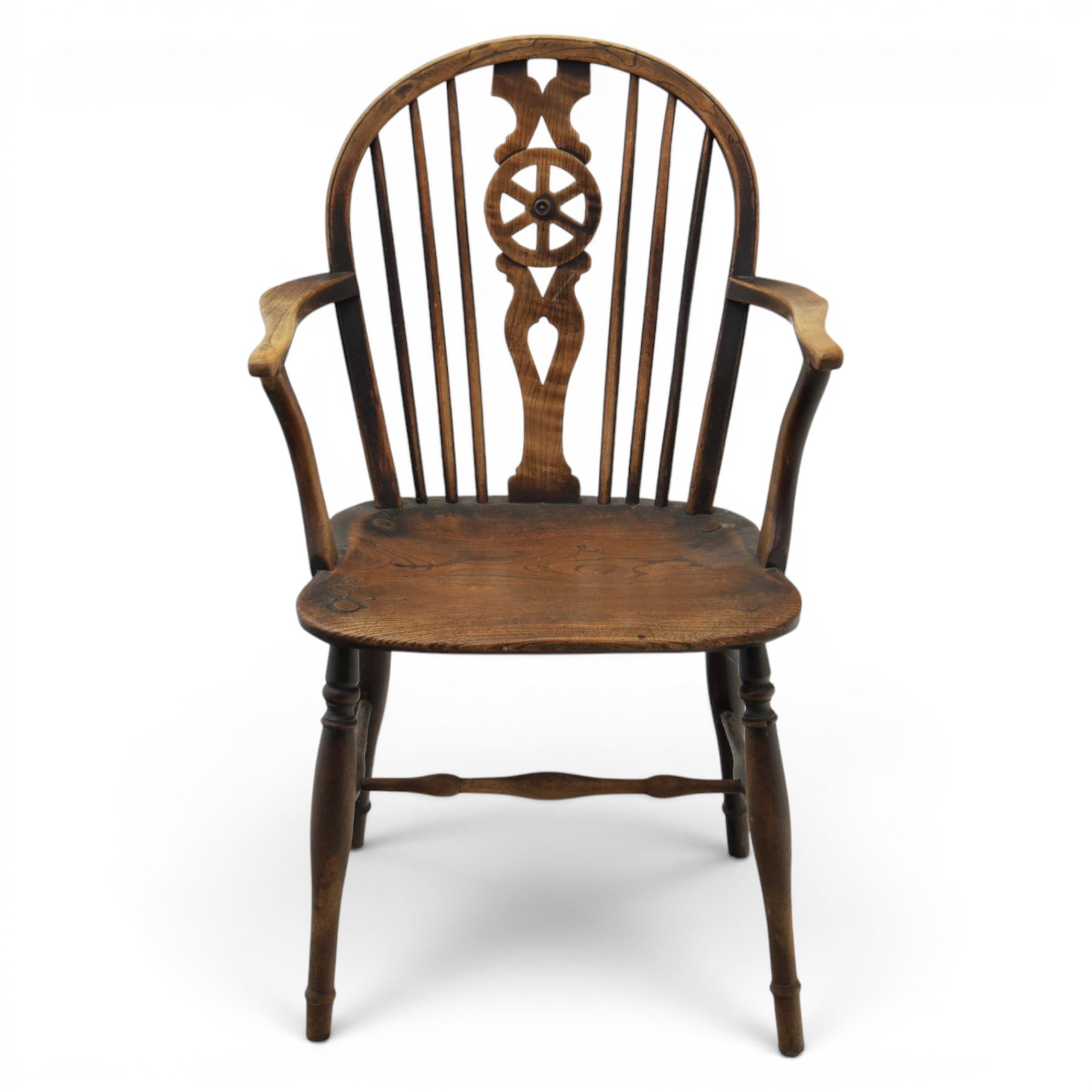 Late 19th century elm and ash low-back Windsor chair, swept arms raised on turned supports  united by H-stretcher