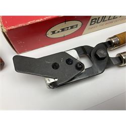 Three modern bullet moulds comprising Lee double cavity .44 calibre, boxed with instructions; and two Lyman .38 calibre; all in unrelated 19th century mahogany box