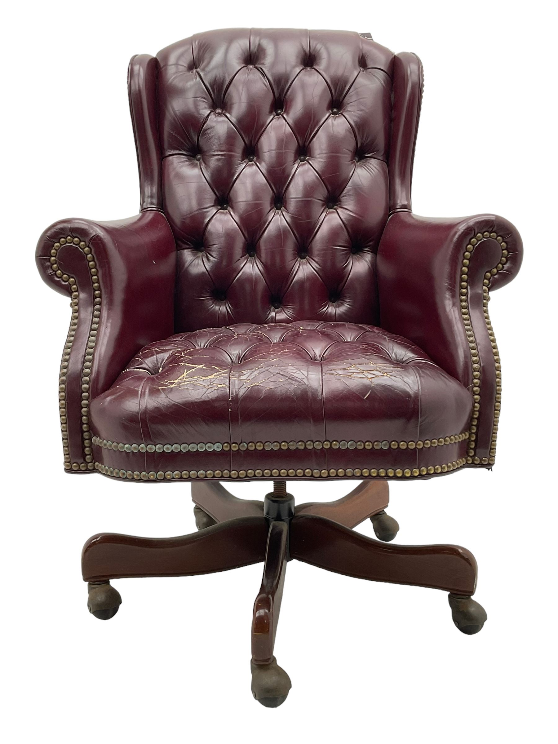 Hancock & Moore - swivel office desk chair, upholstered in buttoned burgundy leather with studded bands, five-spoke base on castors