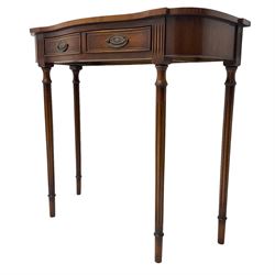 Regency design mahogany serpentine console table, fitted with single drawer disguised as two with cockbeaded facia, raised on fluted tapering supports