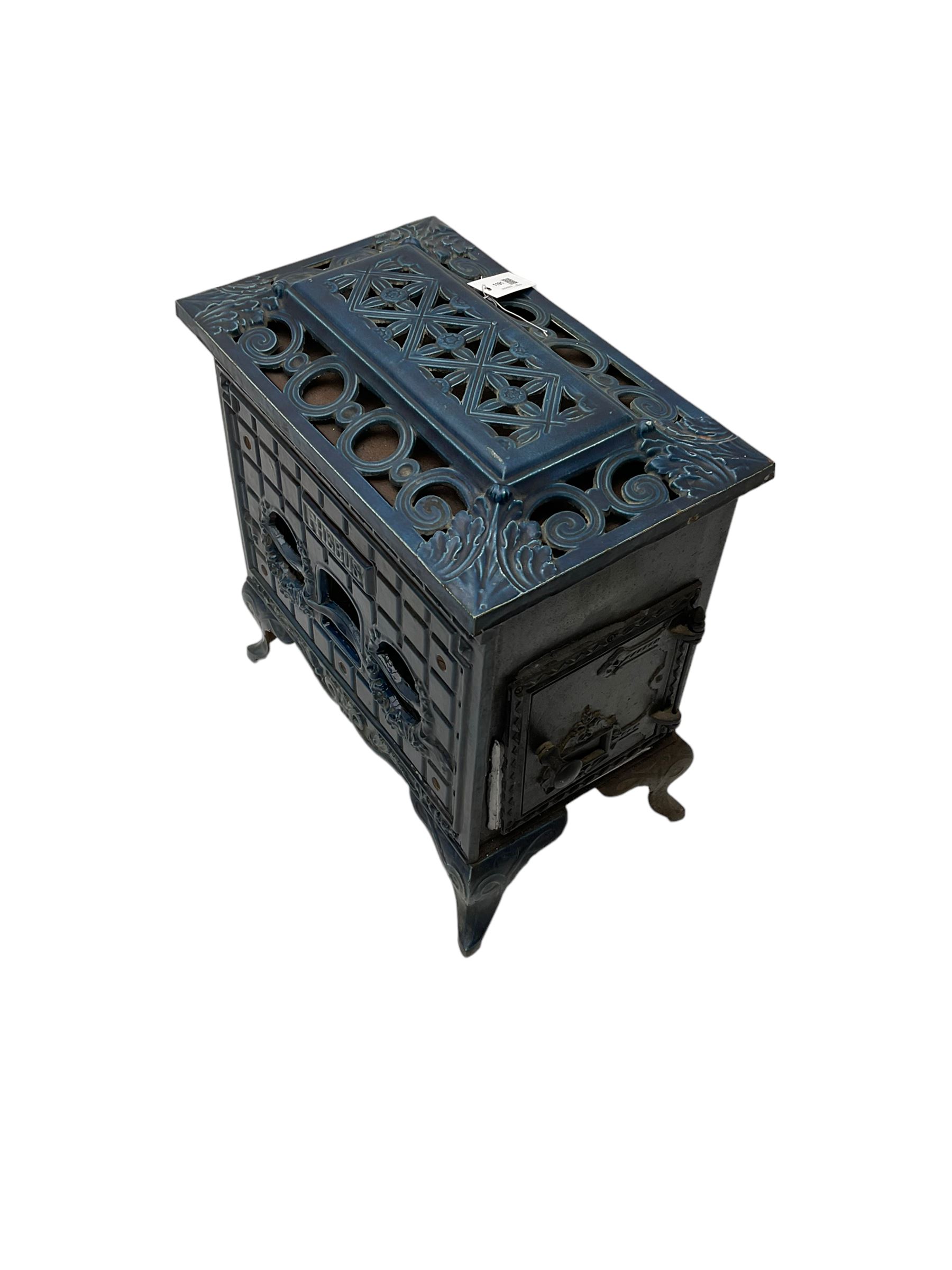 Poeles Nanquette - Art Deco 'Phebus' French enamel wood burning stove, indigo colour with pierced scrollwork decoration and acanthus leaves, on cabriole supports