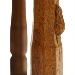 Mouseman - mid-20th century oak stool, the rectangular rush seat raised on turned octagonal supports united by box stretcher, with carved mouse signature, by the workshop of Robert Thompson of Kilburn