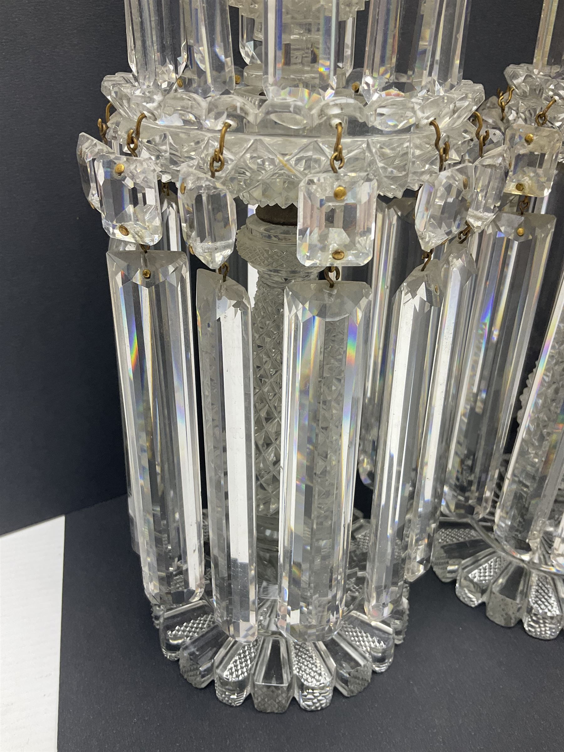 Pair of Victorian clear glass lustres, each with two tiered cut glass bowls supporting cut clear glass lustre drops upon central hobnail cut stem, H29cm