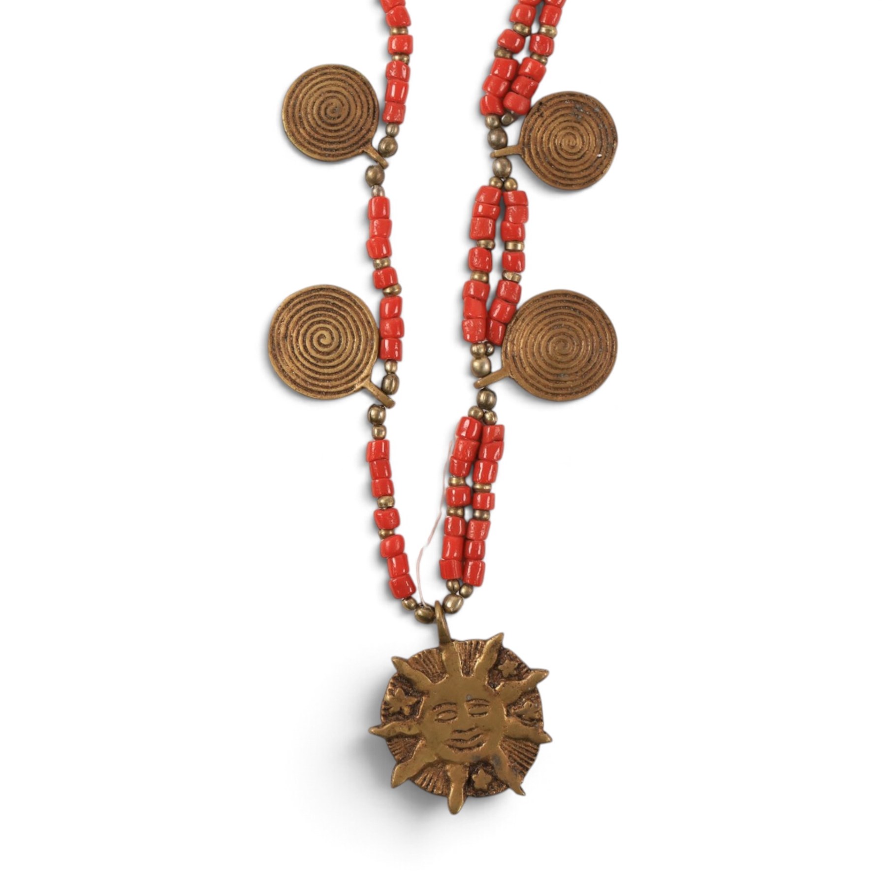 Collection of Middle Eastern jewellery, including silvered multi strand necklace with beadwork and filigree decoration with three cylindrical pendants, pendant necklace with central orange cabochon, beadwork choker and similar  