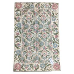 Kashmiri hand stitched crewel work rug, repeating quatrefoil panels with flower head and foliage decoration 