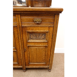  Victorian oak mirror back sideboard, floral carved cresting rail, three piece bevel edge mirror back, turned supports, three drawers above three cupboards, W150cm, H214cm, D54cm  