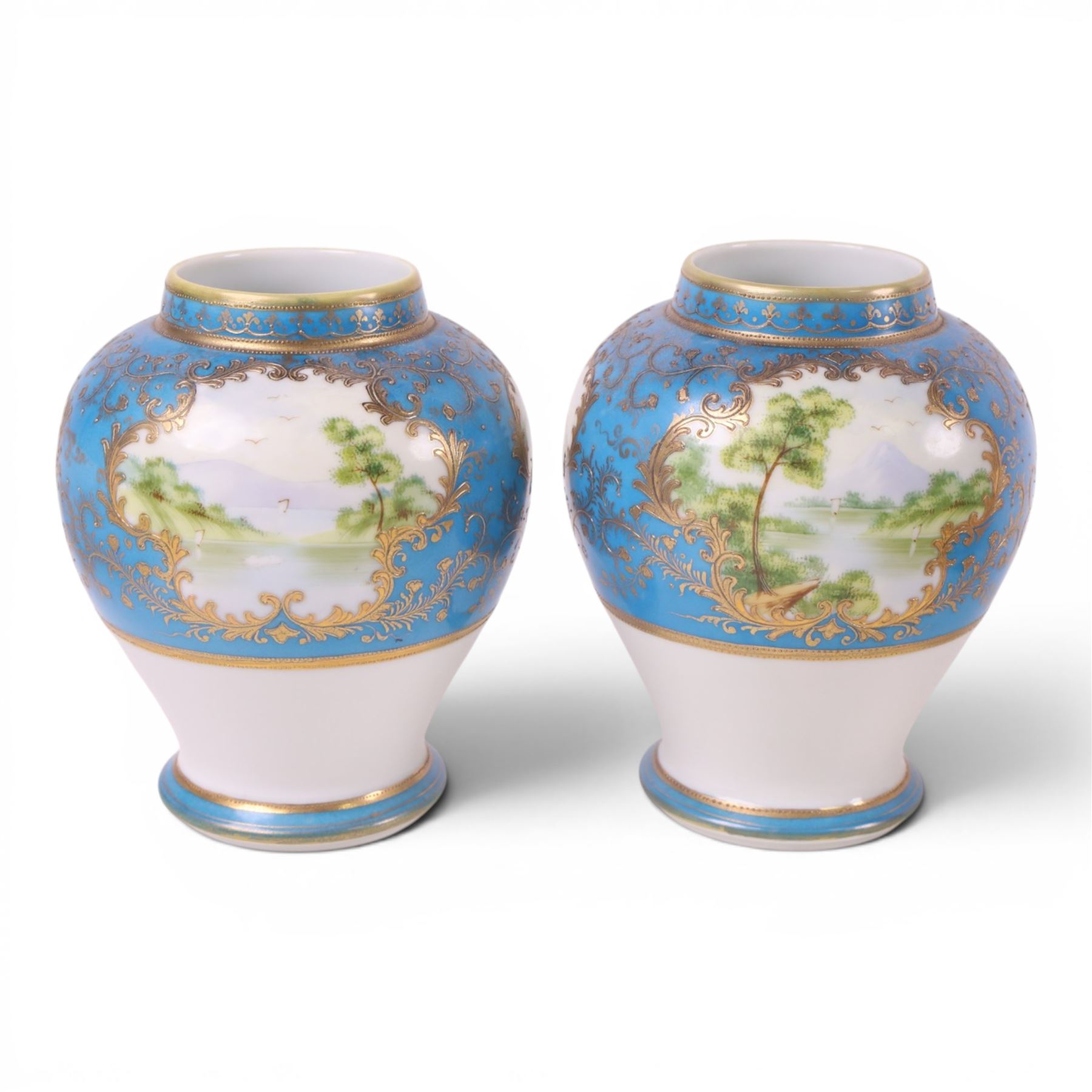 Pair of Noritake vases, of baluster form, decorated with a seascape on a blue ground, together with Noritake ceramics, including jug, trinket dishes etc