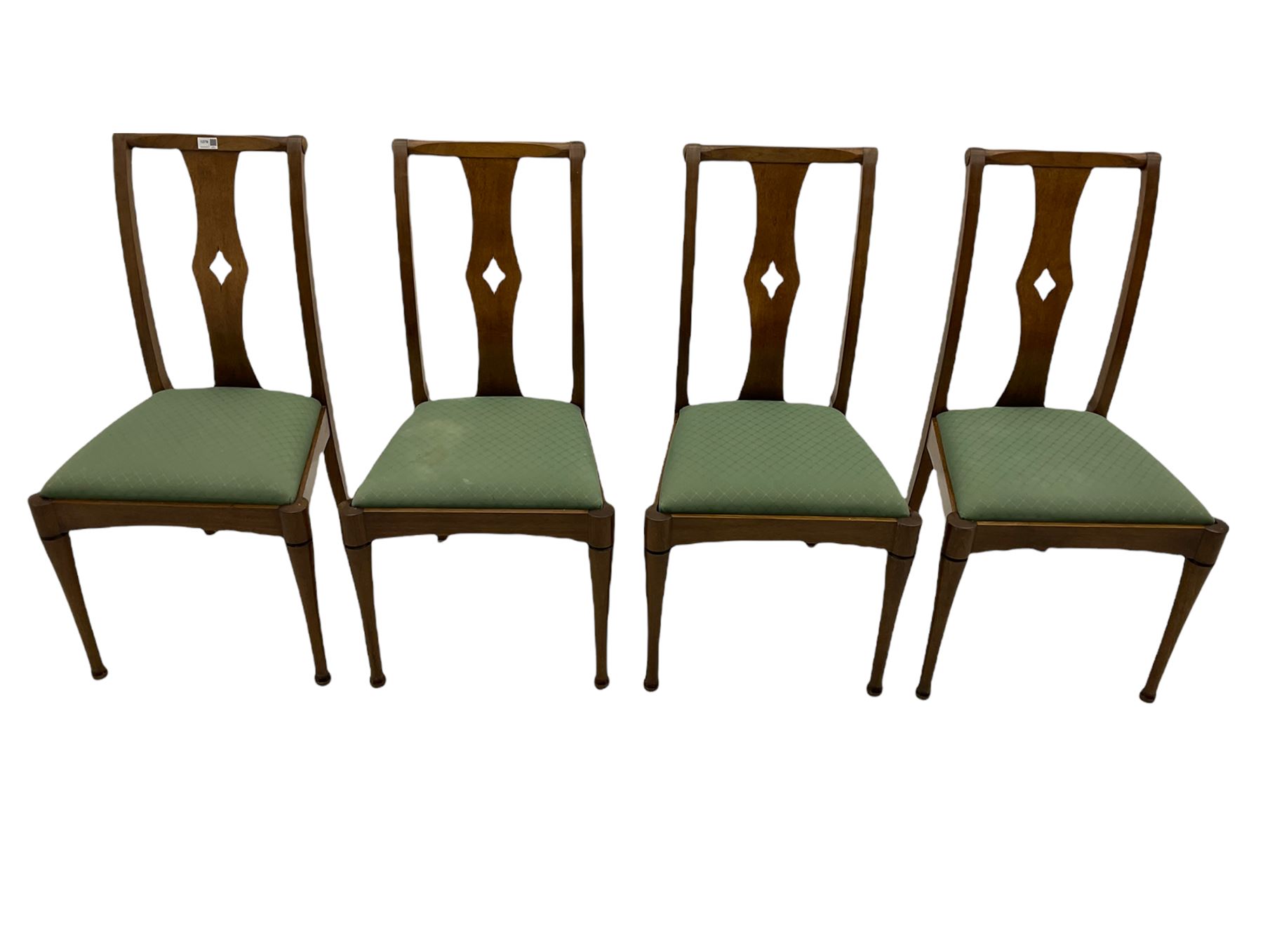 Set of eight contemporary walnut dining chairs, curved backs set with shaped splats with pierced detail, drop in upholstered seat cushions, on turned supports 