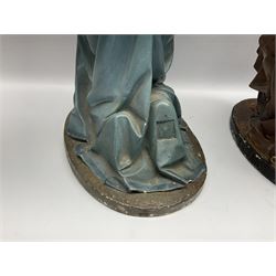 Two religious painted plaster figures of Mary and Joseph kneeling on oval plinths, with impressed mark 'Raffl et Cie Paris', H60cm 