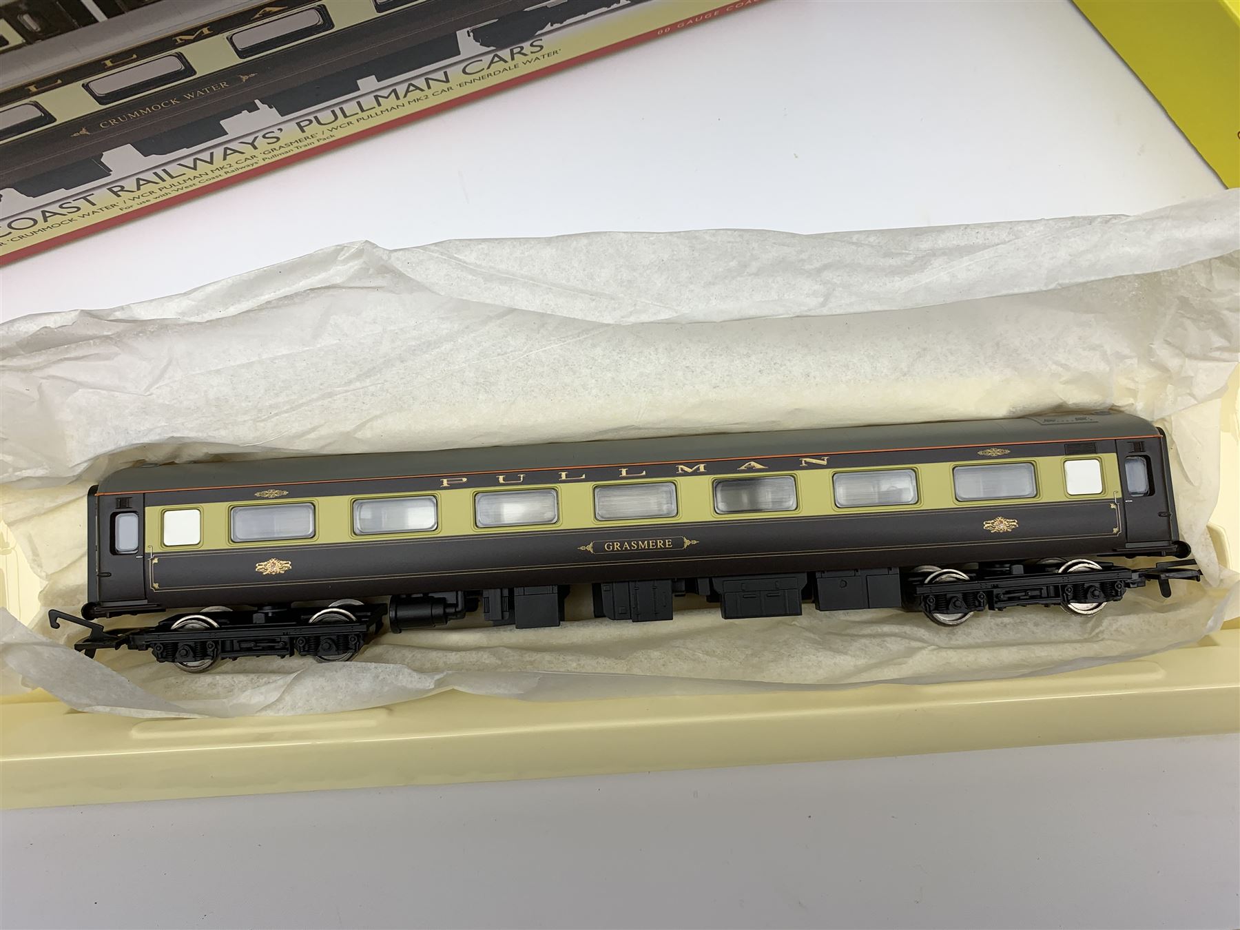 Hornby '00' gauge - 'West Coast Railways' Pullman train pack, three passenger coaches 'Crummock Water', 'Grasmere' and 'Ennerdale Water'; all mint and boxed in slip-case