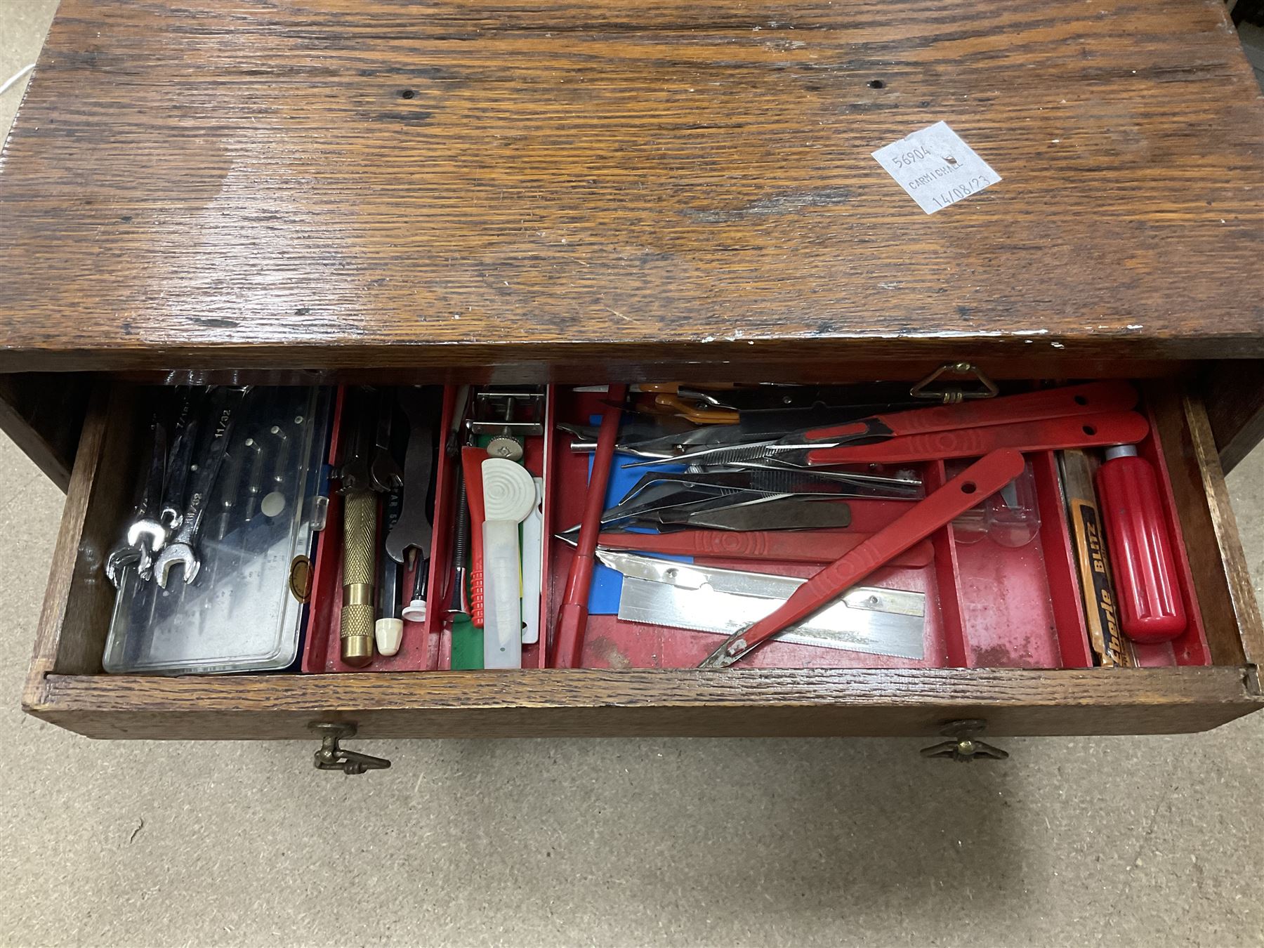 Six shelved cabinets for displaying ‘00’ gauge locomotives comprising plain plywood and white painted examples with track applied to various shelves, largest H63cm, W107cm, D27cm; Collection of tools for building model locomotives to include Weller PU-2D Soldering Pencil and Standard Tip Soldering Iron 20W/230V, Humbrol Modellers Airbrush, Power Supply Units and two wooden chests one of which housing a collection of tools including tweezers, scalping tools, wrenches etc 